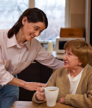 freepik-female-caretaker-with-client-home-doing-her-job-2 freepik-female-caretaker-with-client-home-doing-her-job-2